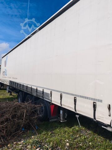 Open semitrailer with tarp KÖGEL MEGA Hubdach, Vario FIX, 1. Liftachse