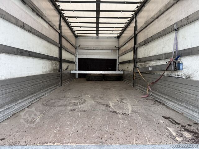Flatbed truck with tarp Iveco Eurocargo 160-280