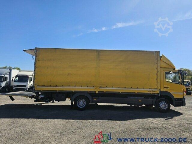 Flatbed truck with tarp Mercedes-Benz Atego 1227 Plane Spriegel LBW BÄR 1.500 Kg + AHK