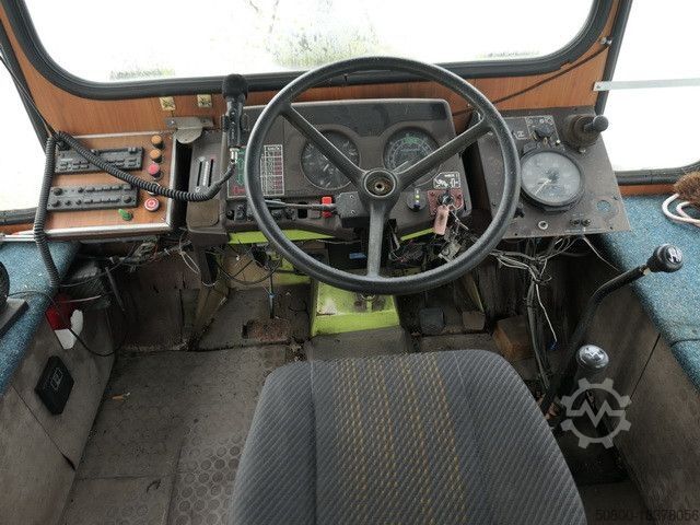 Van Cordes Zugmaschine (Lokomotive) Personenanhänger