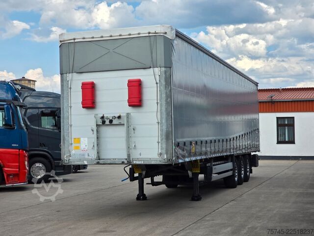 Auflieger mit Pritsche & Plane SCHMITZ CARGOBULL SCB*S3 * PR.+PL. * PLANE UNBESCHRIFTET *