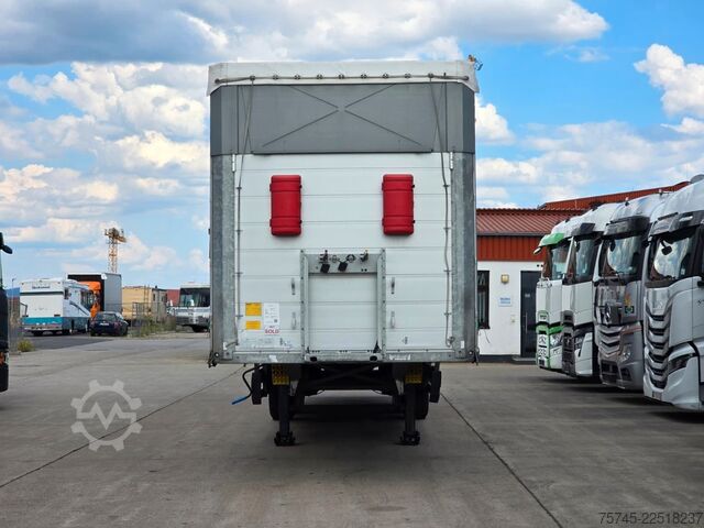 Auflieger mit Pritsche & Plane SCHMITZ CARGOBULL SCB*S3 * PR.+PL. * PLANE UNBESCHRIFTET *