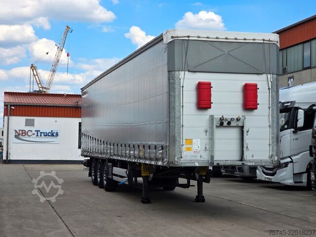 Auflieger mit Pritsche & Plane SCHMITZ CARGOBULL SCB*S3 * PR.+PL. * PLANE UNBESCHRIFTET *