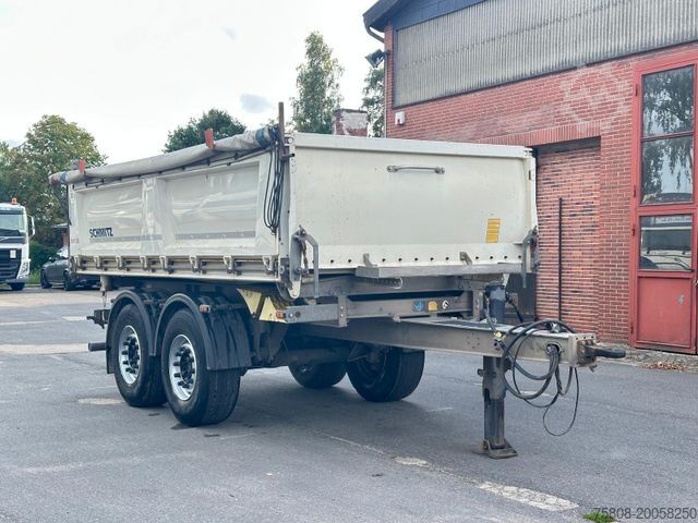 Three-way tipper trailer SCHMITZ CARGOBULL SGF C2 Tandem 3Seitenkipper