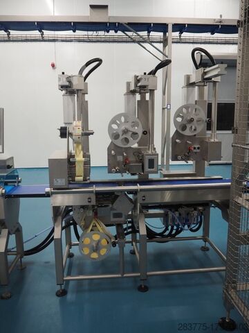 Top and bottom Labeller VWS Nederland B.V. Octopus Ace Tripple Top 7 Base Labelling