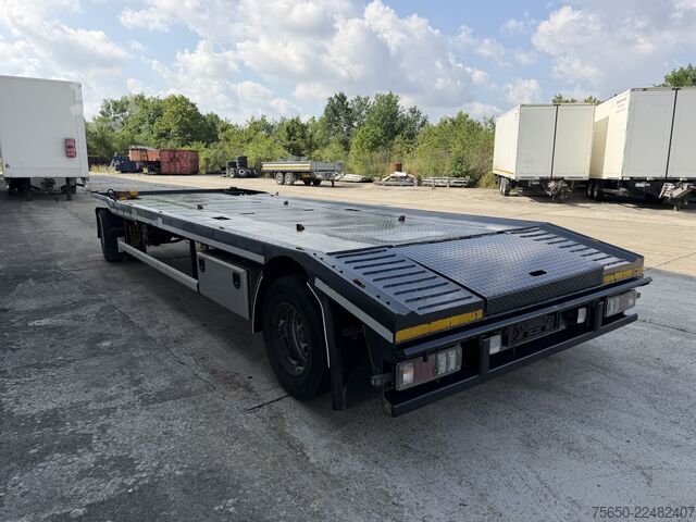 Low loader trailer Hüffermann ISA  2 Achs Abrollanhänger- Tieflader