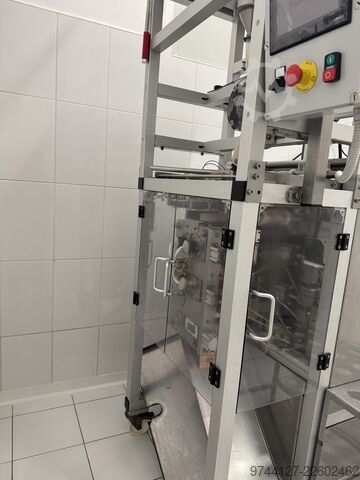 Liquid pouch filling, closing, and packaging machine NKR 