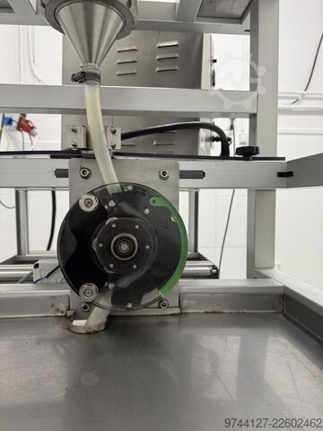 Liquid pouch filling, closing, and packaging machine NKR 