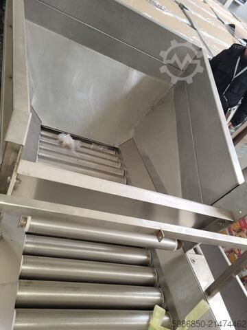 Hopper with JBT roller feeder  