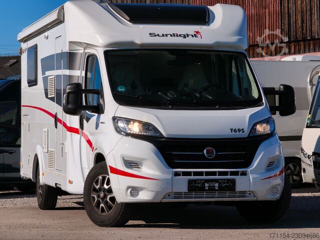 Teilintegriertes Wohnmobil SUNLIGHT T 69 S, Quensbett, SAT, Hubbett, Navi,1 Hand