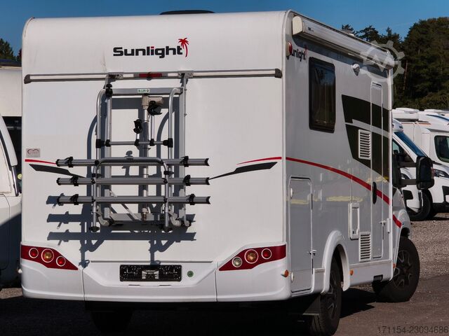 Teilintegriertes Wohnmobil SUNLIGHT T 69 S, Quensbett, SAT, Hubbett, Navi,1 Hand
