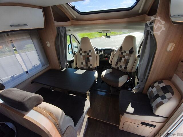 Teilintegriertes Wohnmobil SUNLIGHT T 69 S, Quensbett, SAT, Hubbett, Navi,1 Hand