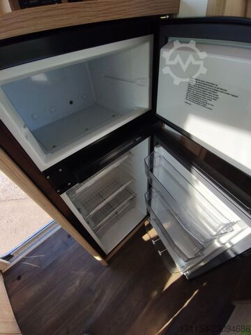 Teilintegriertes Wohnmobil SUNLIGHT T 69 S, Quensbett, SAT, Hubbett, Navi,1 Hand