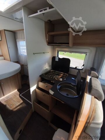 Teilintegriertes Wohnmobil SUNLIGHT T 69 S, Quensbett, SAT, Hubbett, Navi,1 Hand