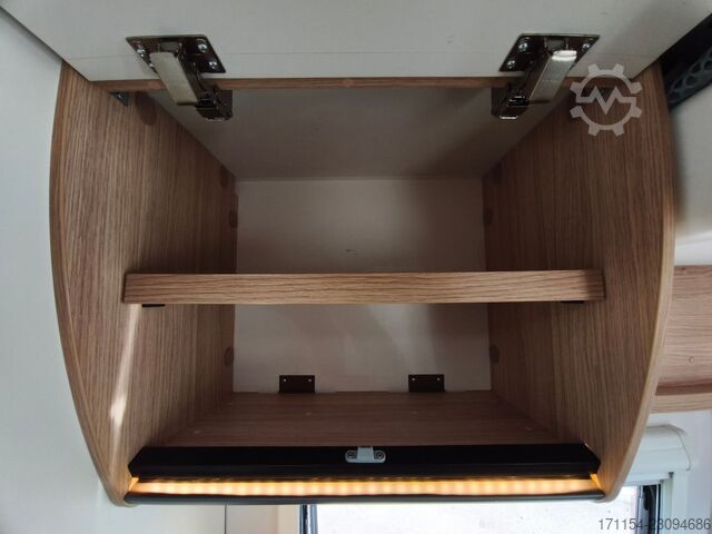 Teilintegriertes Wohnmobil SUNLIGHT T 69 S, Quensbett, SAT, Hubbett, Navi,1 Hand