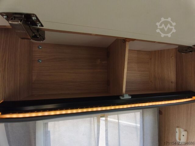 Teilintegriertes Wohnmobil SUNLIGHT T 69 S, Quensbett, SAT, Hubbett, Navi,1 Hand
