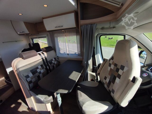 Teilintegriertes Wohnmobil SUNLIGHT T 69 S, Quensbett, SAT, Hubbett, Navi,1 Hand