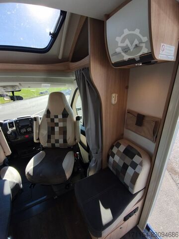 Teilintegriertes Wohnmobil SUNLIGHT T 69 S, Quensbett, SAT, Hubbett, Navi,1 Hand