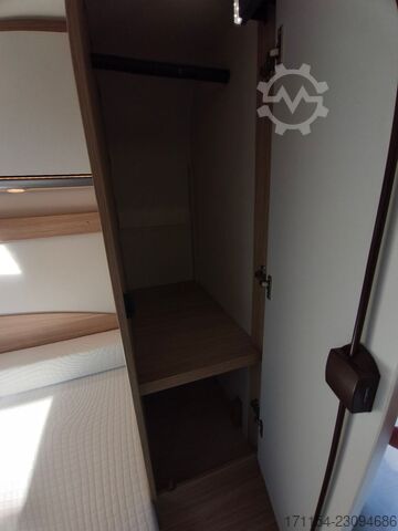 Teilintegriertes Wohnmobil SUNLIGHT T 69 S, Quensbett, SAT, Hubbett, Navi,1 Hand