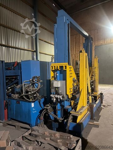 Pack press with plastic strappin Pack press Signode AK2-200