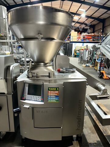 Automatic sausage filling linking line with auto tray loading. Handtmann VF628, PVLS143, GM310 and ZB311
