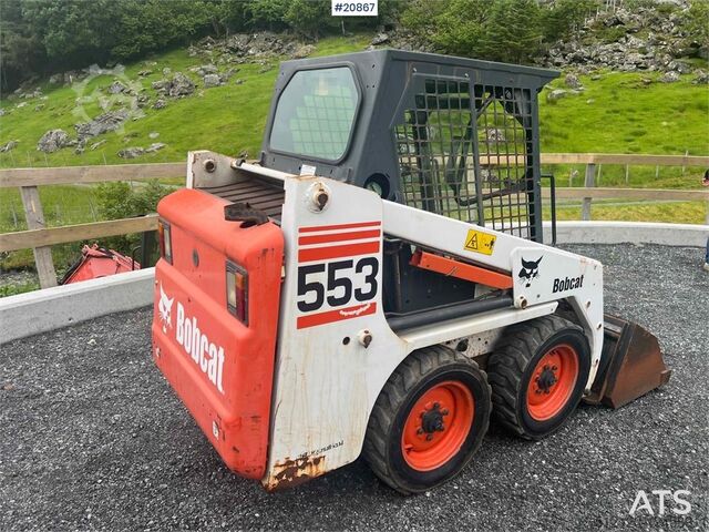 Loader Bobcat 553 compact loader w/ bucket and pallet forks. WAT