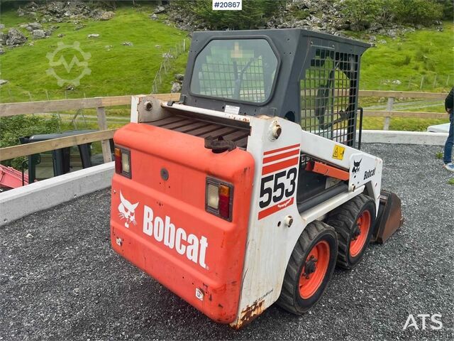 Loader Bobcat 553 compact loader w/ bucket and pallet forks. WAT