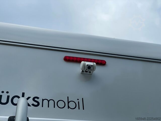 Alkoven Wohnmobil GLUECKSMOBIL A 60 SP | Markise,Solar,AHK,TV+omatisch