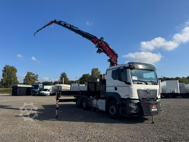 Flatbed truck MAN 26.470 6x4-4 Hydrodrive Fassi Kran F545 Jib