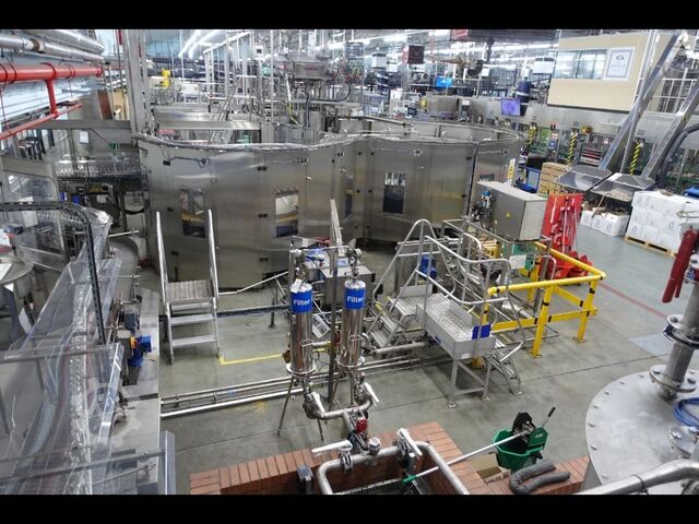 Used KRONES spirits filling line, roud glass 500 BPM - year 2003 Krones 