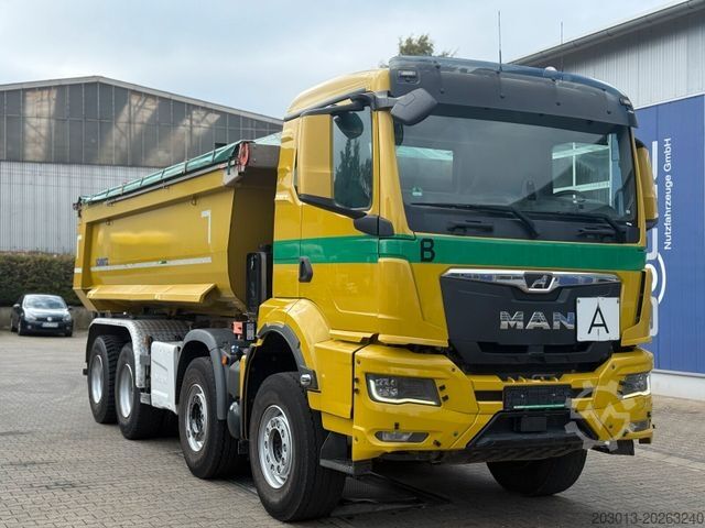 Tipper truck MAN TGS 32.470 8x4 Muldenkipper Schmitz elekt. Plane