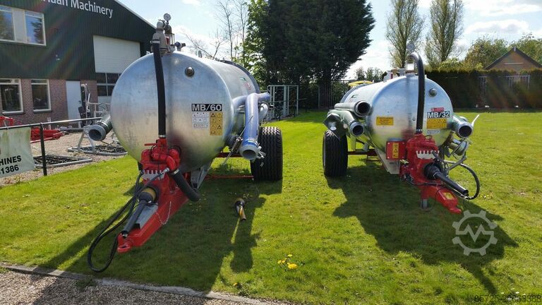 Manure spreader  Watertank met haspel