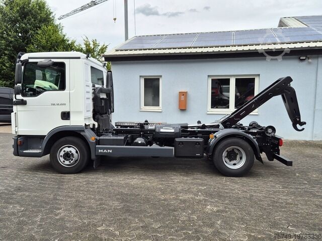 Roll-off tipper truck man TGL 12.220 BL City Abrollkipper AHK Euro 6