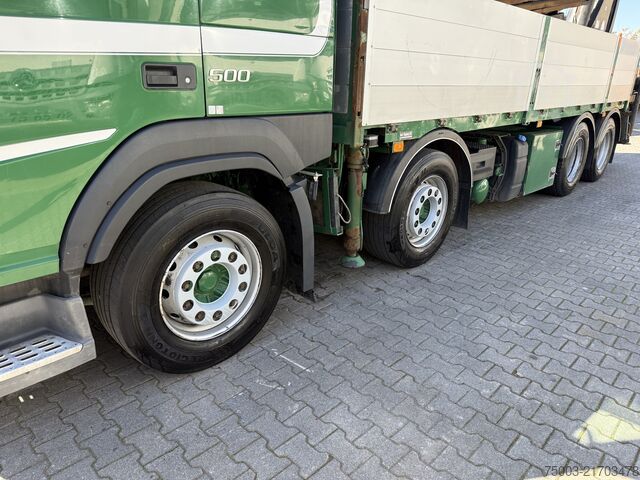 Flatbed truck Volvo FM500 8X4 Kran Hiab 408 Jib bis 30 Meter