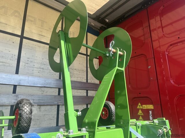 Drip hose laying attachment  