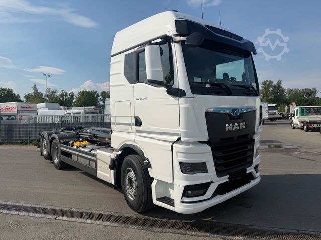 Roll-off tipper truck MAN TGX 26.540 BL Meiller Tectum RS21.70 MIETE