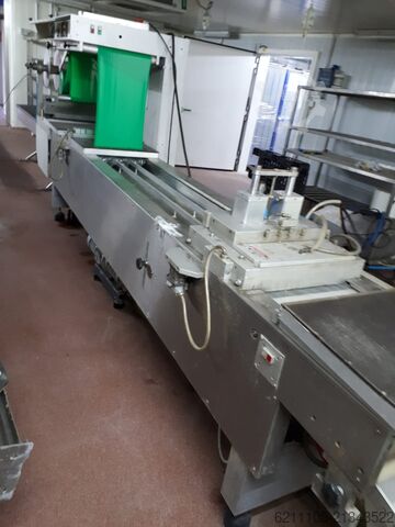 Vacuum shrink-wrap machine Multivac R 7000