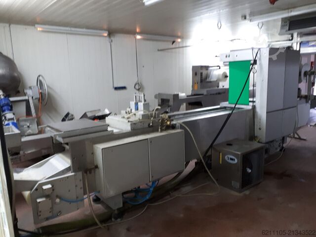 Vacuum shrink-wrap machine Multivac R 7000
