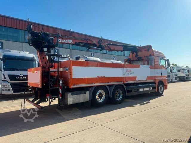 Flatbed truck MAN TGX 26.480*RETARDER*BAUSTOFF*ATLAS KRAN*KOMPLETT