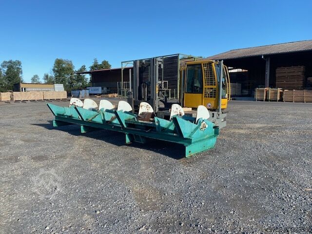 Disc inserter for round timber