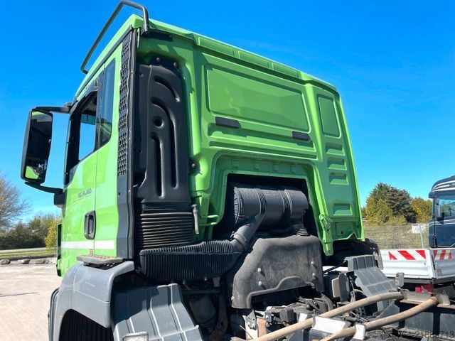 Three-sided tipper truck MAN TGS 26.460 / Meiller Stahl 3-Seitenkipper/6x6/AP
