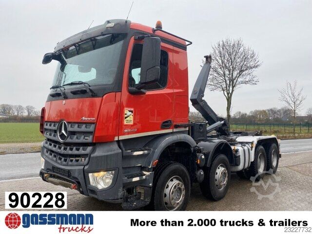 Roll-off tipper truck Mercedes-Benz Arocs 3243 K 8x4/4,