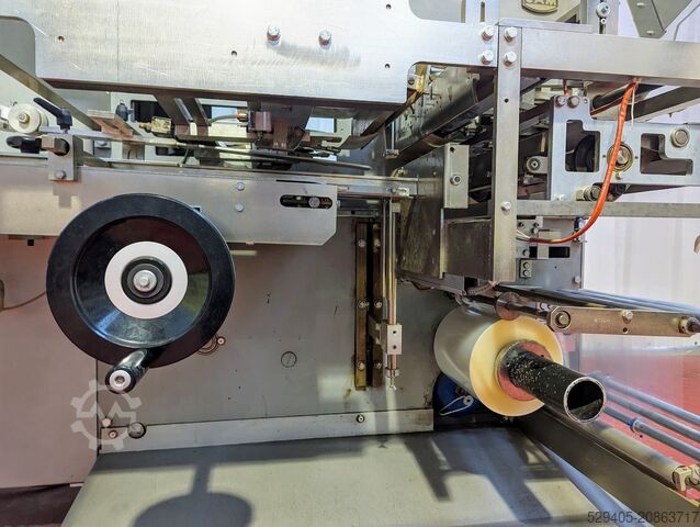 Cellophaneuse / Enveloppeuse automatique horizontale à mouvements alternatifs. CAM AP