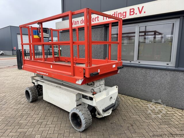 Holland-Lift Y 64 EL 14 Scherenarbeitsbühne / Scherenbühne 8,4 m Arbeitshöhe elektrisch 2015 HOLLAND-LIFT Y 64 EL 14 Schaarhoogwerker / Sciccor lift 8.4M Werkhoogte Elektrisch 2015