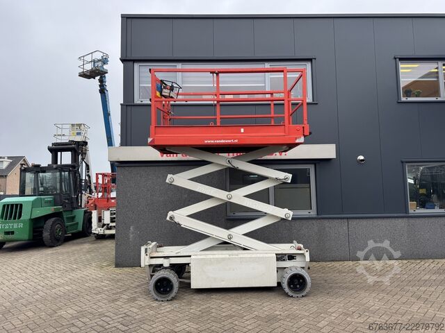 Holland-Lift Y 64 EL 14 Scherenarbeitsbühne / Scherenbühne 8,4 m Arbeitshöhe elektrisch 2015 HOLLAND-LIFT Y 64 EL 14 Schaarhoogwerker / Sciccor lift 8.4M Werkhoogte Elektrisch 2015