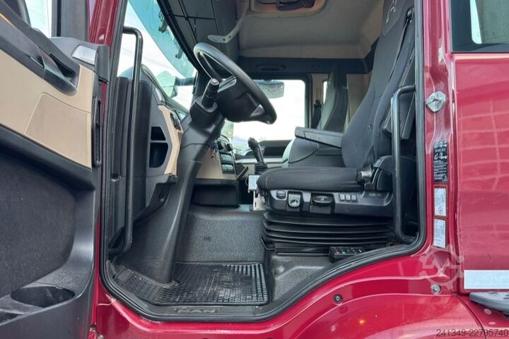 Roll-off tipper truck MAN TGS 35.500 10x4 Trösch