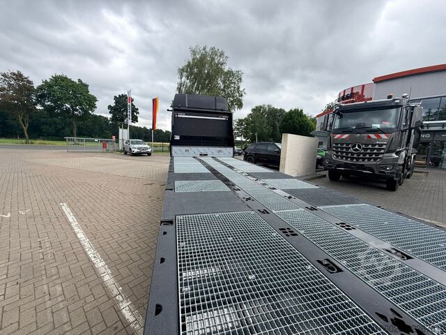 LKW mit Pritsche (offen) MAN Maschinentransporter Baumaschinentaxi mit Rampen