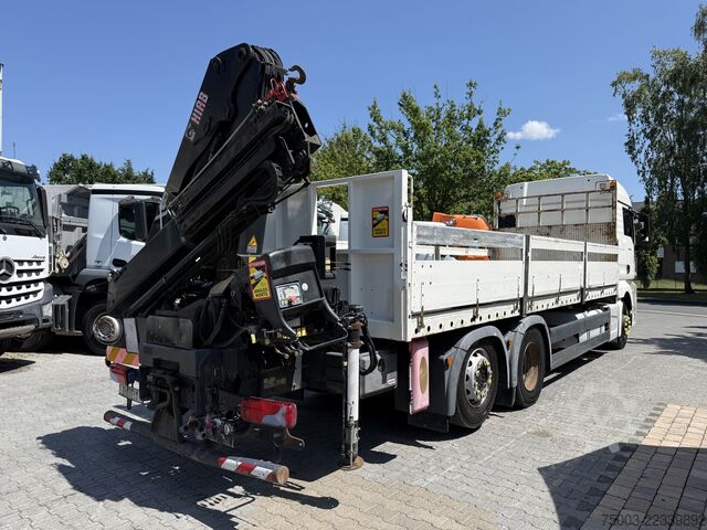 Flatbed truck MAN TGX 26.440 6X2 Kran Hiab 144