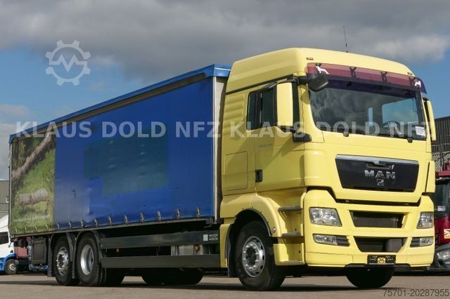 Flatbed truck with tarp MAN TGX 26.400 Lift-/Lenkachse Vollluft LBW Euro 5