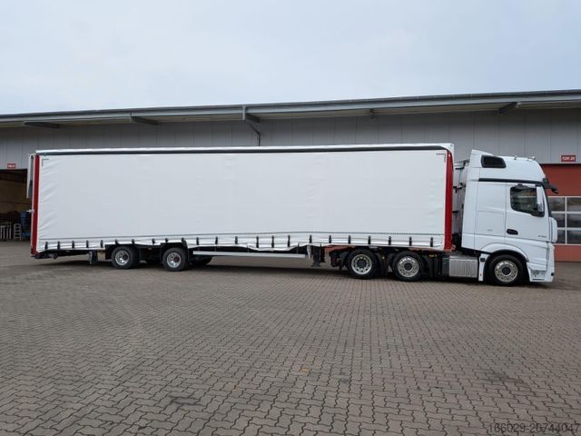 Open semitrailer with tarp  Wiese Gabelstaplertransporter mit Rampe